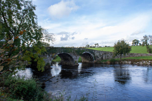 istock Stone arch bridge over the river Blackwater 1388772204