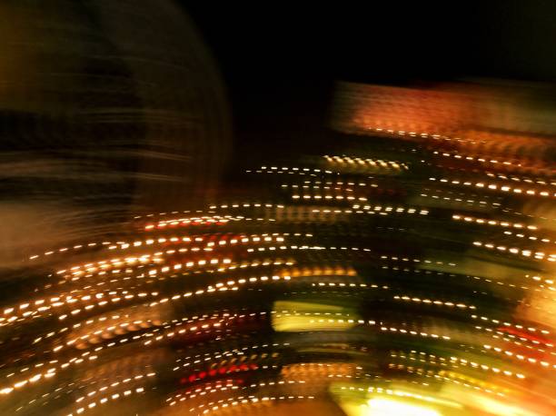 istock Abstract background. Light vortex. Colored lights in motion. Swirl 1388772555
