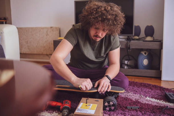 istock A local electronics repairman working from home fixing a skateboard 1388772693