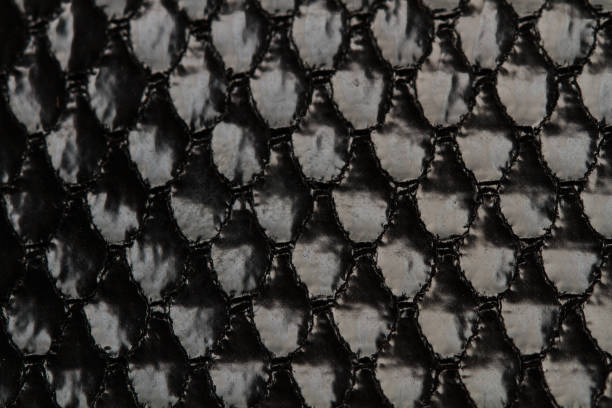 istock A texture of a black satin cloth in a close up view 1388774734