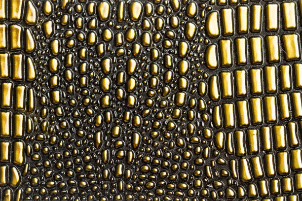 istock A texture of a golden plastic cloth with bubbles 1388774741