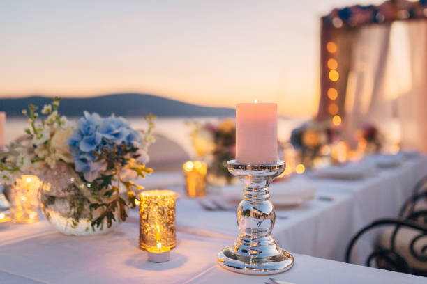 istock Close-Up Of Illuminated Place Setting At Restaurant Against Sky During Sunset 1388776280