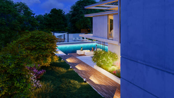 istock Impressive modern  mansion with pool at dusk 1388780922