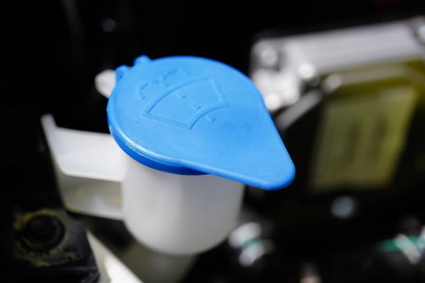 istock Car windshield wiper cleaning spray water 1388793084