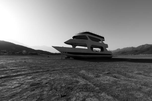Hunting boats on the levee of a swamp shore