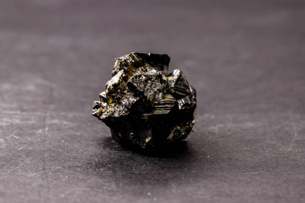 magnetite stone, magnetic material formed by iron oxide, magnet stone used in compasses magnetite stone, magnetic material formed by iron oxide, magnet stone used in compasses crystalline inclusion complex stock pictures, royalty-free photos & images