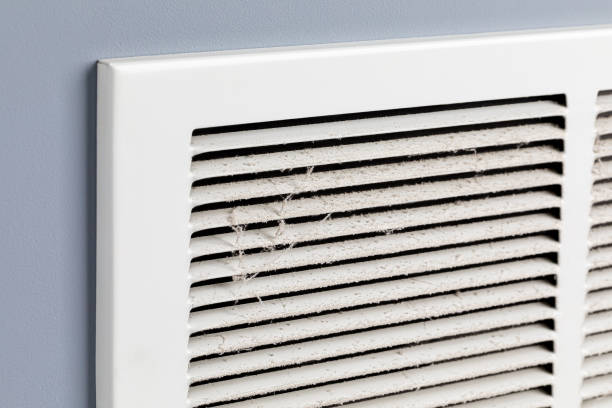 Dirty air vent in house. Household allergies, HVAC duct cleaning, maintenance and house cleaning concept. stock photo