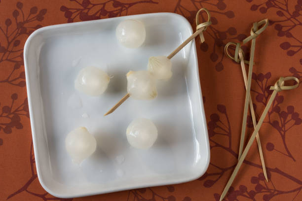 istock White Pearl Onions on Cocktail Picks 1388802737