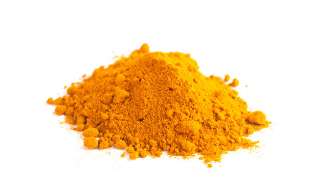 istock A Mound of Ground Turmeric Isolated on a White Background 1388803317