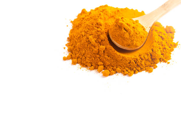 istock A Mound of Ground Turmeric Isolated on a White Background 1388803684