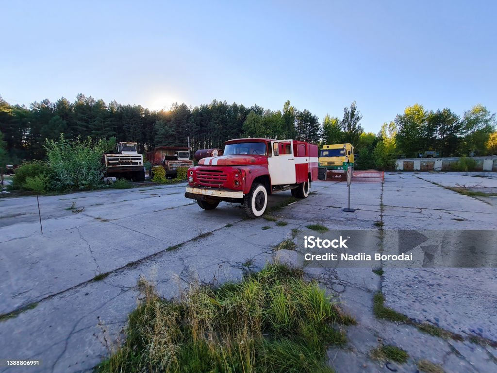 Old rusty abandoned Soviet fire truck in Chernobyl exclusion zone. Rusty fire engine in Chernobyl Nuclear Power Plant Zone Engine Stock Photo
