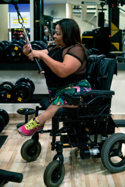 istock Woman with disability at the gym 1388809137