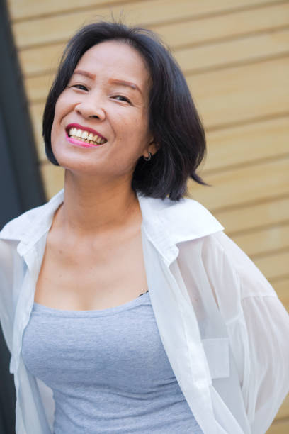 istock Cheerful thai woman portrait 1388814069