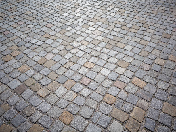 istock cobblestone surface of a city square 1388814178
