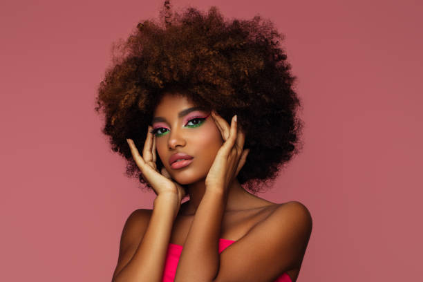 istock Beautiful afro woman with bright make-up 1388814321