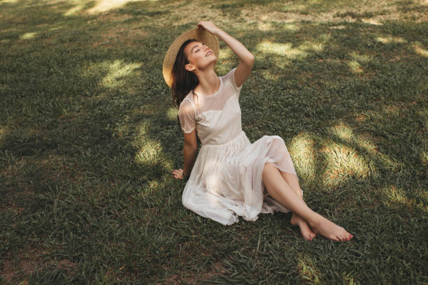 istock Beautiful girl enjoying summer 1388814984