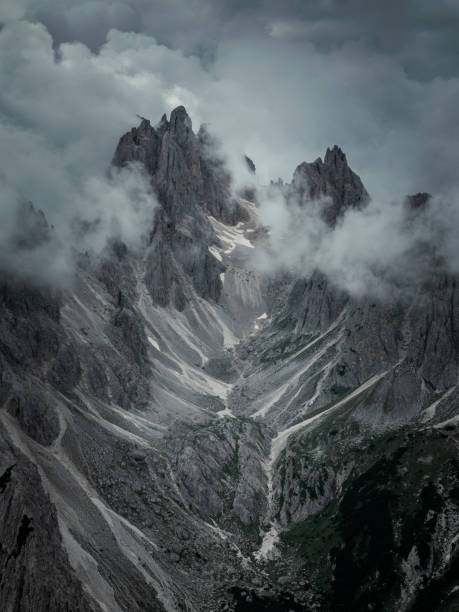 istock Mountain peaks in the Dolomite Alps in South Tyrol with dramatic cloudy sky 1388817896