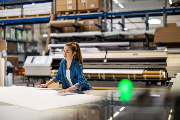 istock Woman working in printing factory 1388821133