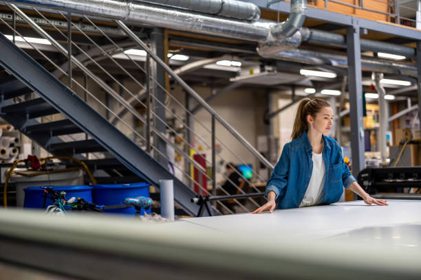 istock Woman working in printing factory 1388822520