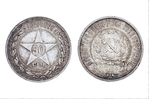 Old Soviet Union coin, 50 kopecks, 1921 year. Isolated on white, front and back side view.