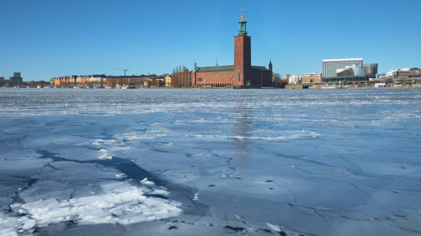 panorama of northern european city looking from water. - stockholm sweden sea winter imagens e fotografias de stock