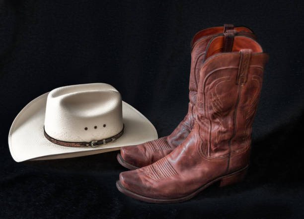 istock Cowboy hat and western boots 1388827246