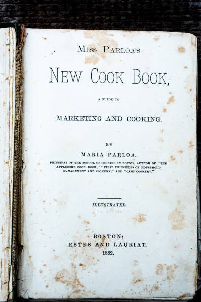 istock Cherry pie with antique cookbook 1388827684