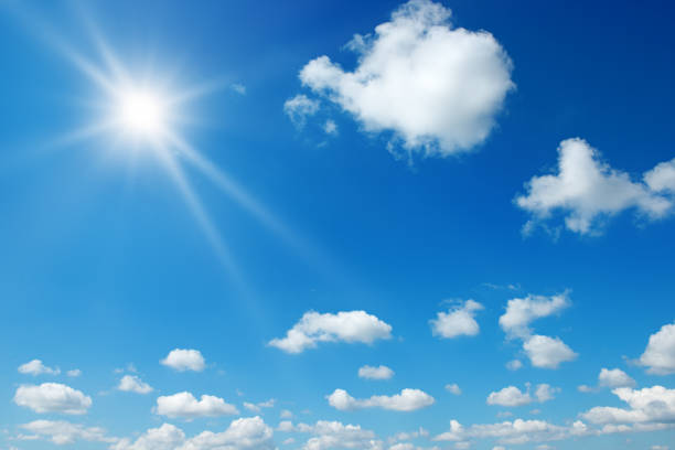 istock Bright sun on beautiful blue sky 1388833822