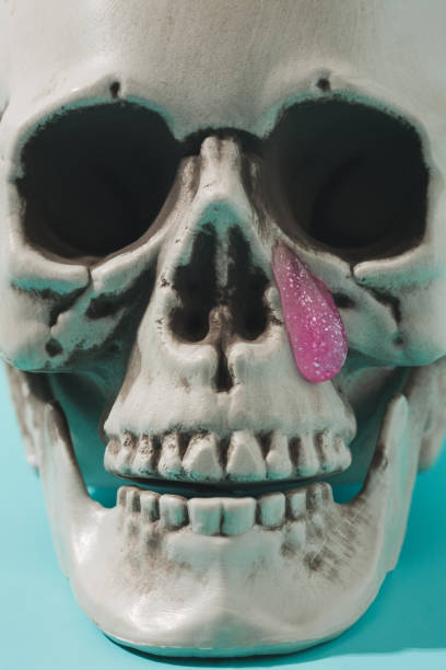 istock Human skull with slime tear falling from the eye. 1388834080
