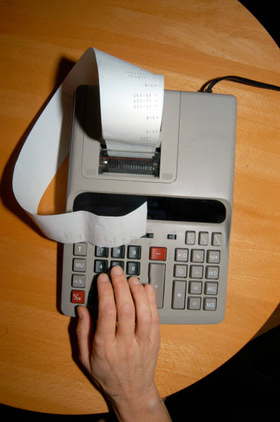istock typing numbers in a calculator 1388838813