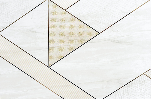 Ceramic tiles with geometric patterns and marble texture.