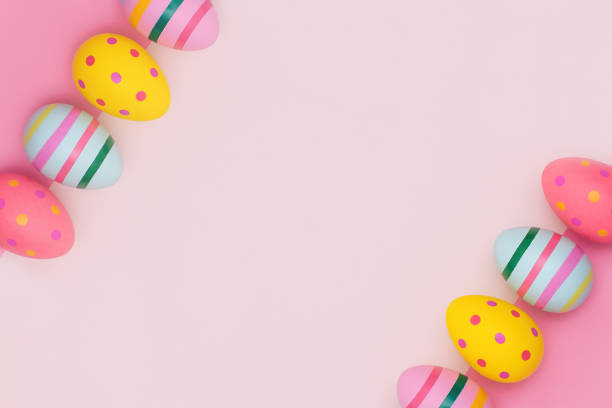istock Bright Easter eggs in retro style on a pink background with copy space. 1388840862