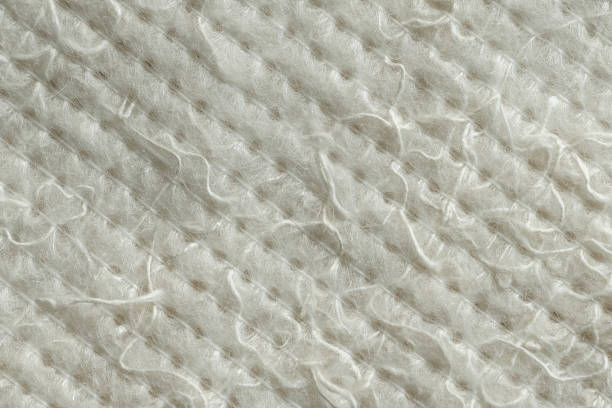 istock Classic floor cleaning cloth. Non woven dweil texture closeup as background 1388842754