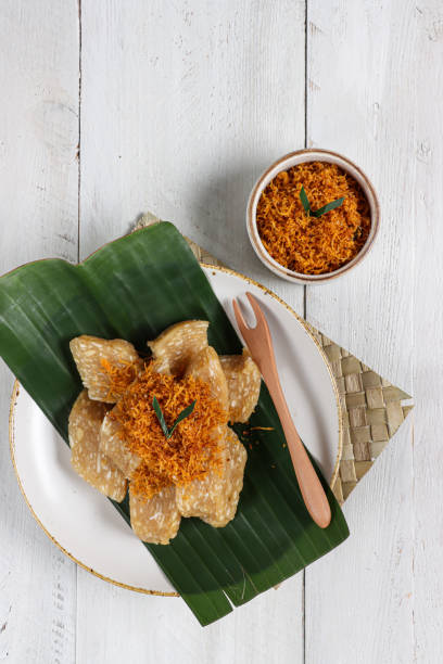 istock Getuk serundeng is a traditional food from Central Java, Indonesia. Getuk made from mashed cassava and covered with sauted grated coconut. 1388864211
