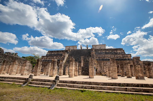 The central temple shows reliefs of warriors and eagles and jaguars devouring human hearts, as well as representations of the god Tlalchitonatiuh.