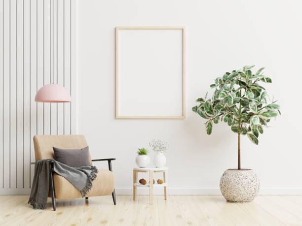 istock Poster mockup with vertical frames on empty white wall in living room interior. 1388865770