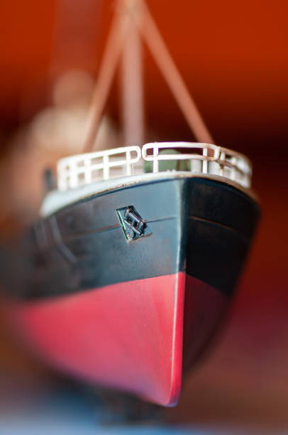 Close-up on a toy boat made of wood. Shallow depth of field