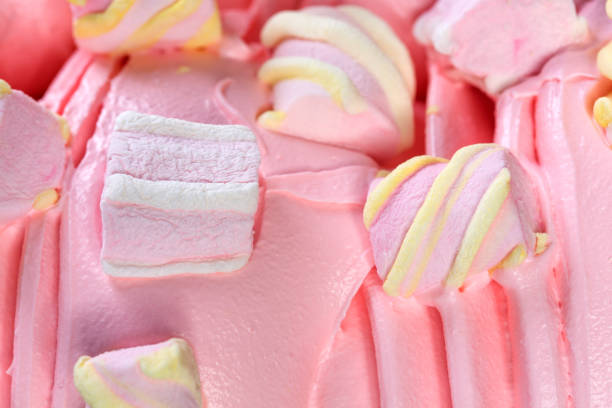istock Soft pink Ice-cream sorbet topped with marshmellow. 1388887304