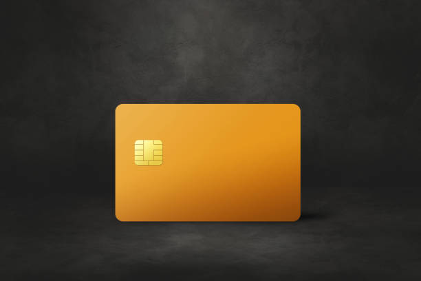 istock Yellow credit card on a black concrete background 1388890409