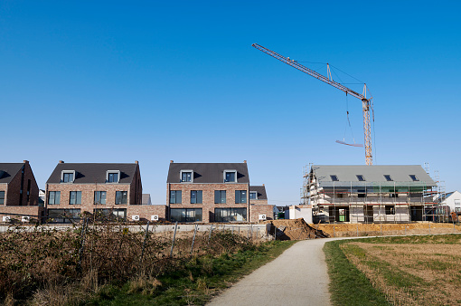 Construction site of a contemporary one-family houses in a new housing area of Düsseldorf- Himmelgeist.