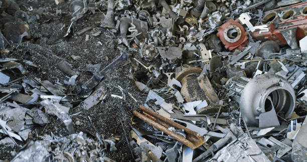 Recycling pile of steel debris in factory.