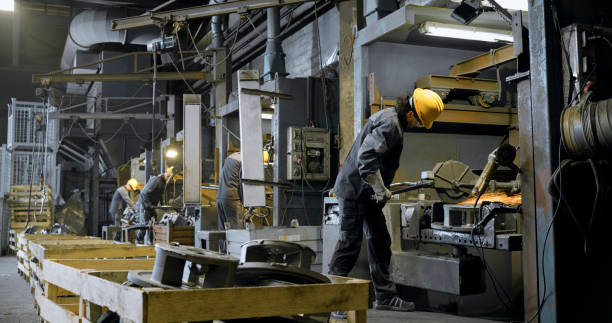 istock Worker grinding in steel mill 1388893708