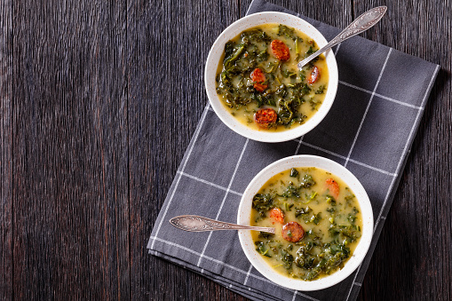 Leek meal in a stainless steel saucepan. High angle view vegetarian food leek