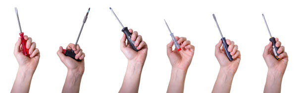istock Male hand holding screwdriver isolated on white background. Collage. 1388897297