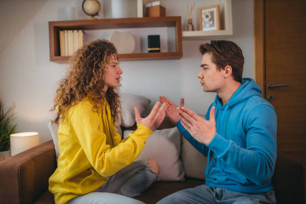 istock Boyfriend and girlfriend are arguing on the couch 1388899255