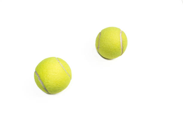 istock Two side tennis balls on white background 1388905287