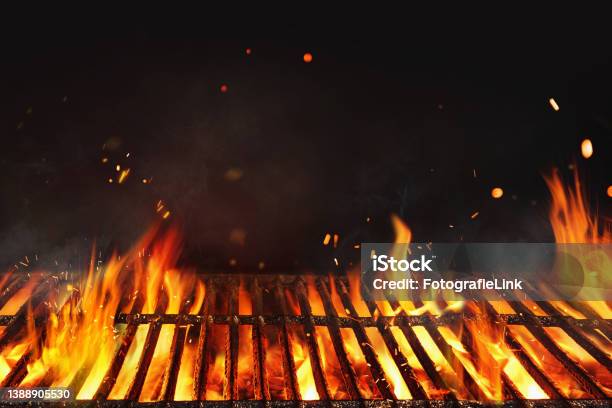 Fire Embers Particles Over Black Background Grill Background Empty Fired Barbecue On Black Abstract Dark Glitter Fire Particles Lights Stock Photo - Download Image Now