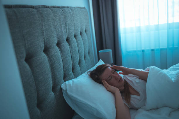 istock Depressed woman awake in the night 1388908264
