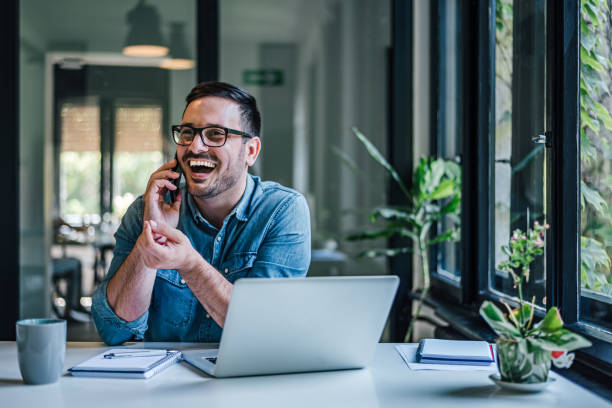 istock Cheerful caucasian man, enjoying sunny and productive day at work. 1388913349