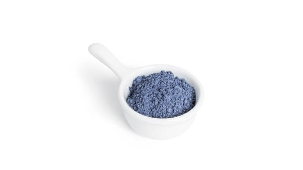 istock Blue matcha powdered tea isolated on white background 1388913350